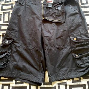 Black cargo shorts size 40 deep pockets used twice . Like brand new